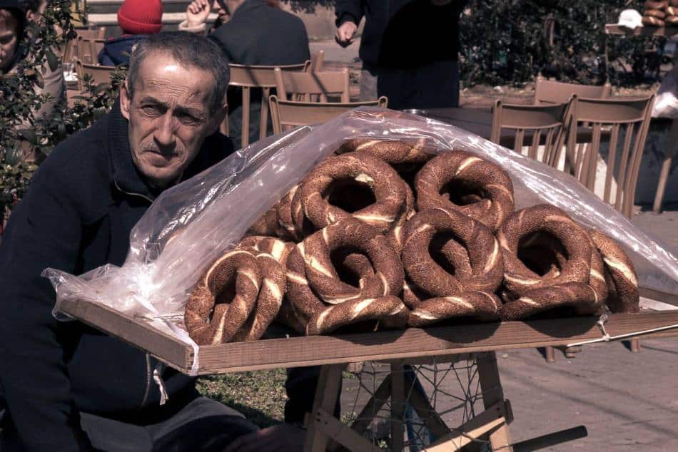 Street vendor in Istanbul, selling simit, some type of traditional Turkish bagels