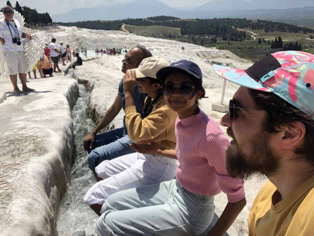 Enjoying the fresh thermal water running through the travertines in Pamukkale.