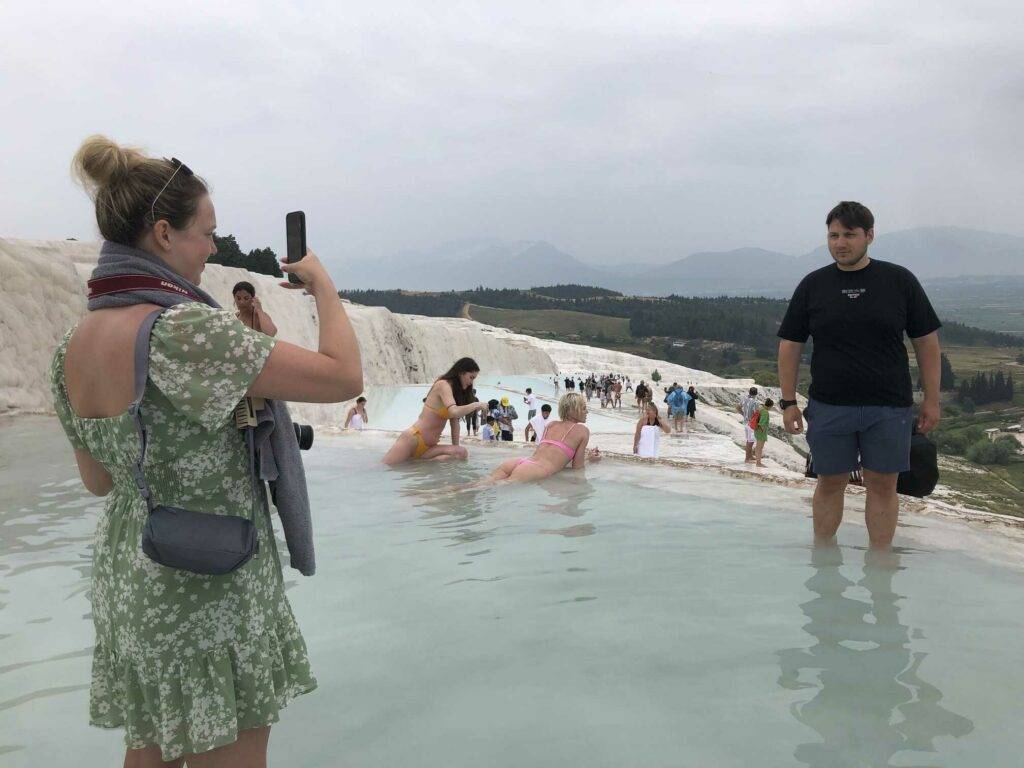 Taking pictures in Pamukkale travertines.