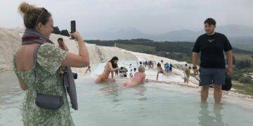 Taking pictures in Pamukkale travertines.