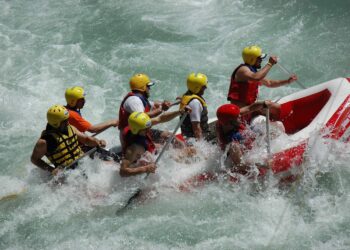 Turkey adventure holidays: raft speeding over white-water rapids in Antalya’s canyon landscapes.