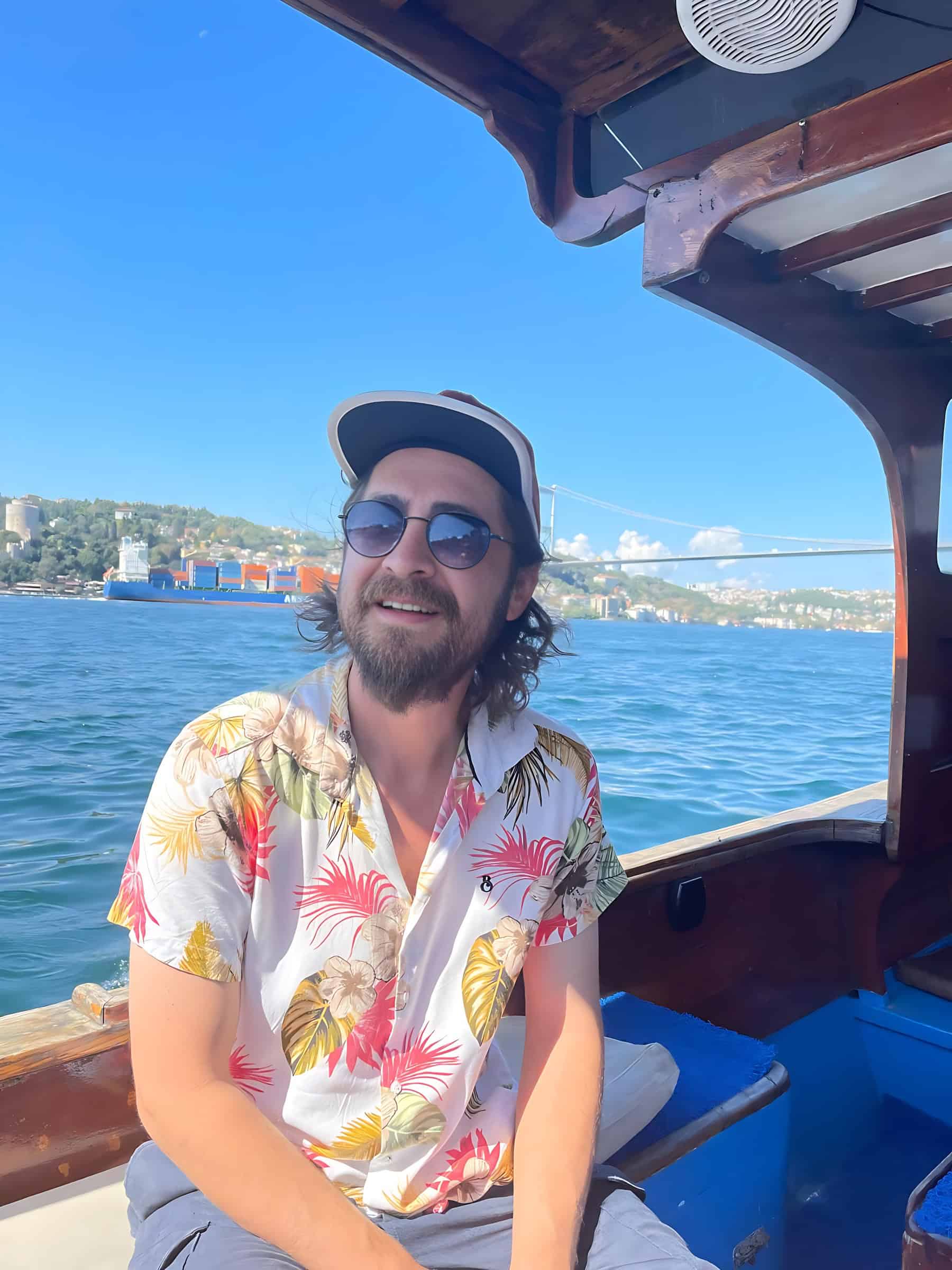 Fethi Karatas, founder of The Other Tour, on a boat on the Bosphorus