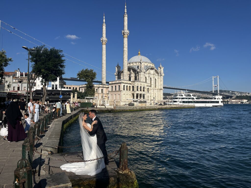 Ortakoy Mosque with a groom and bride taking pre-wedding pictures in 2025