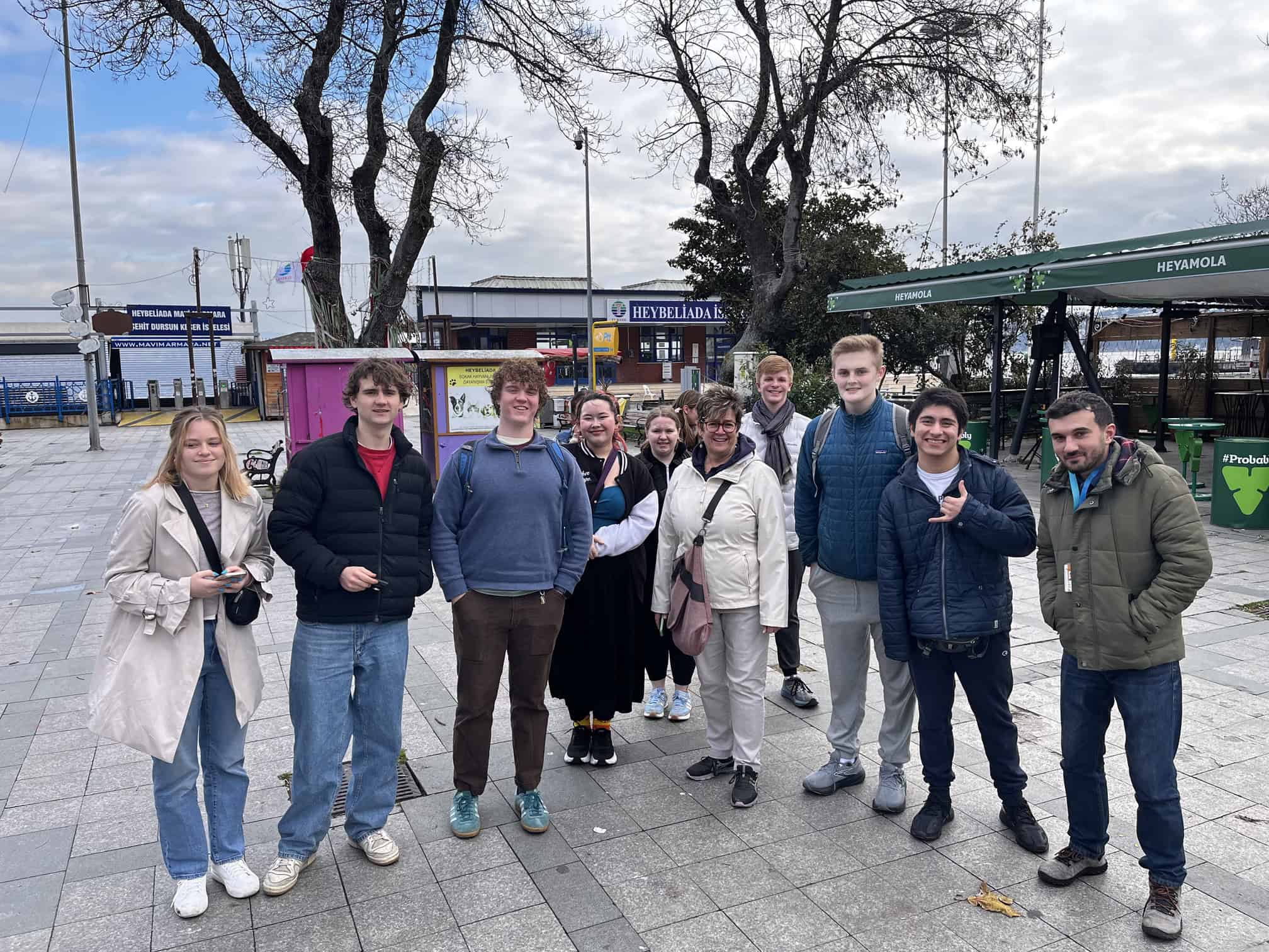 A university group standing together on an Istanbul street with their guide