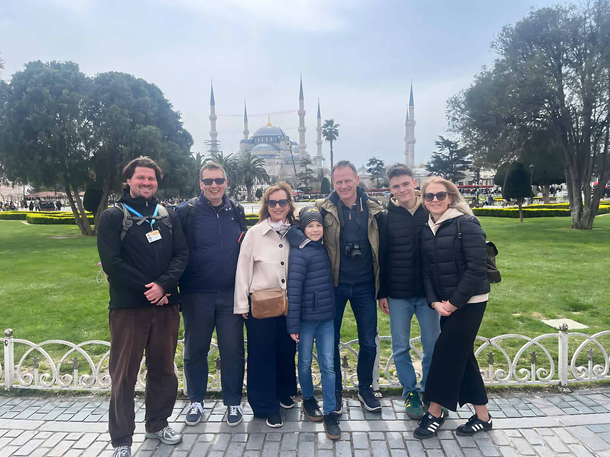 Deniz Karagozoglu with a group in Sultanahmet Square, the Blue Mosque behind