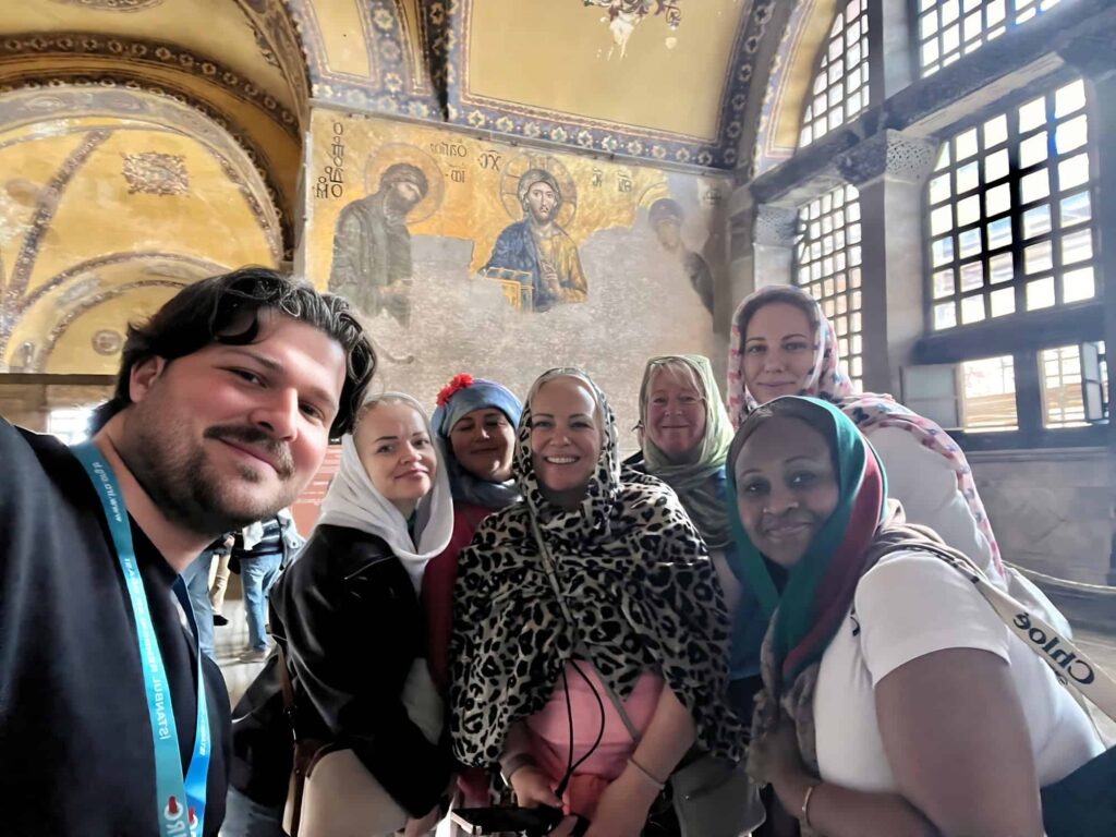 Deniz Karagozoglu guiding clients inside Hagia Sophia