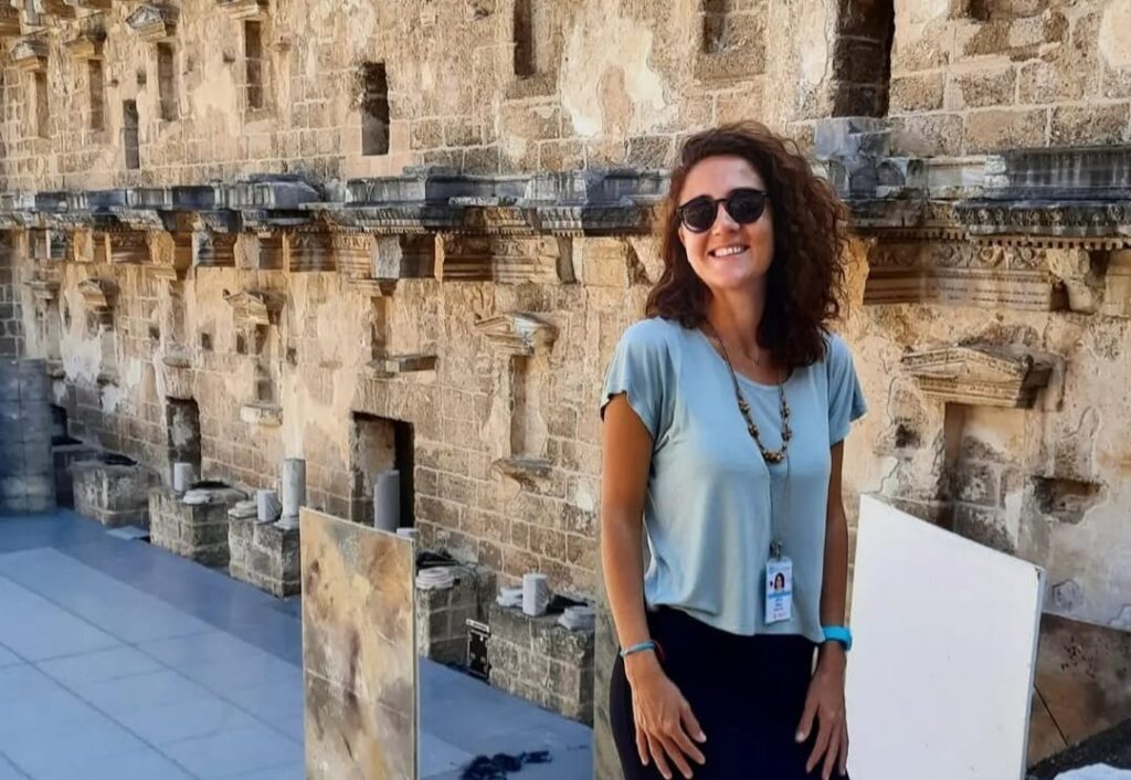 Betül Başak at a Roman theatre archaeological site, Turkey