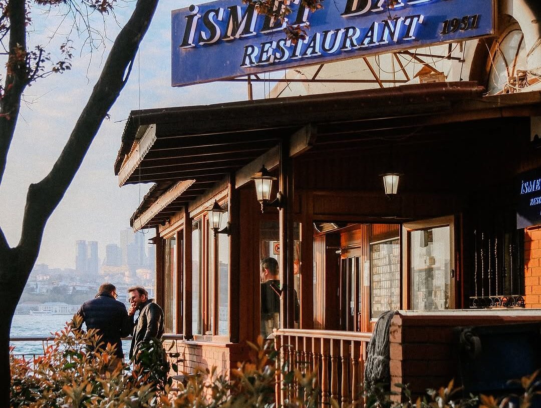Exterior of İsmet Baba Restaurant, a historic Bosphorus seafood restaurant in Istanbul with waterfront views and outdoor seating