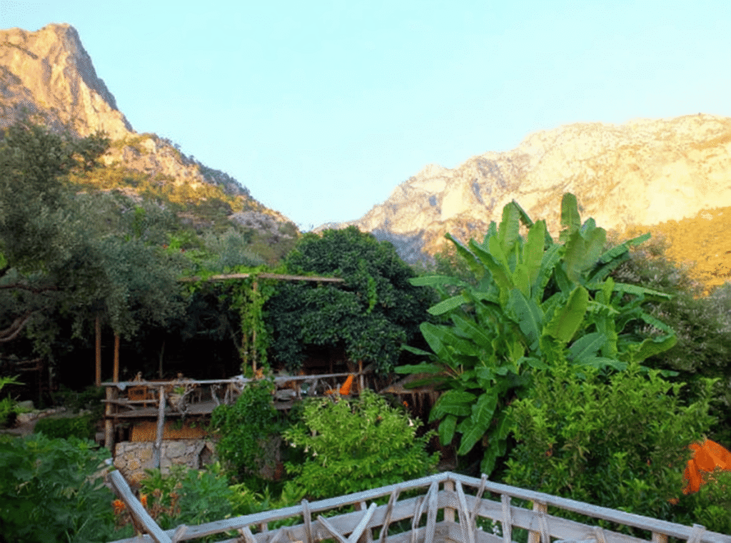 Eco-friendly accomodation surrounded by lush greenery and mountains in Kabak Valley near Fethiye, Türkiye.