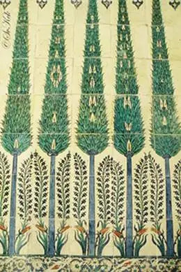 Traditional Ottoman İznik tiles decorated with stylized cypress trees and floral motifs.
