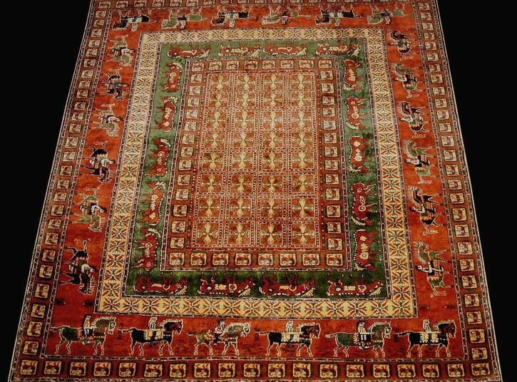 The Pazyryk Carpet, the world's oldest known pile carpet, dating to the 5th century BCE and featuring intricate geometric and animal motifs.