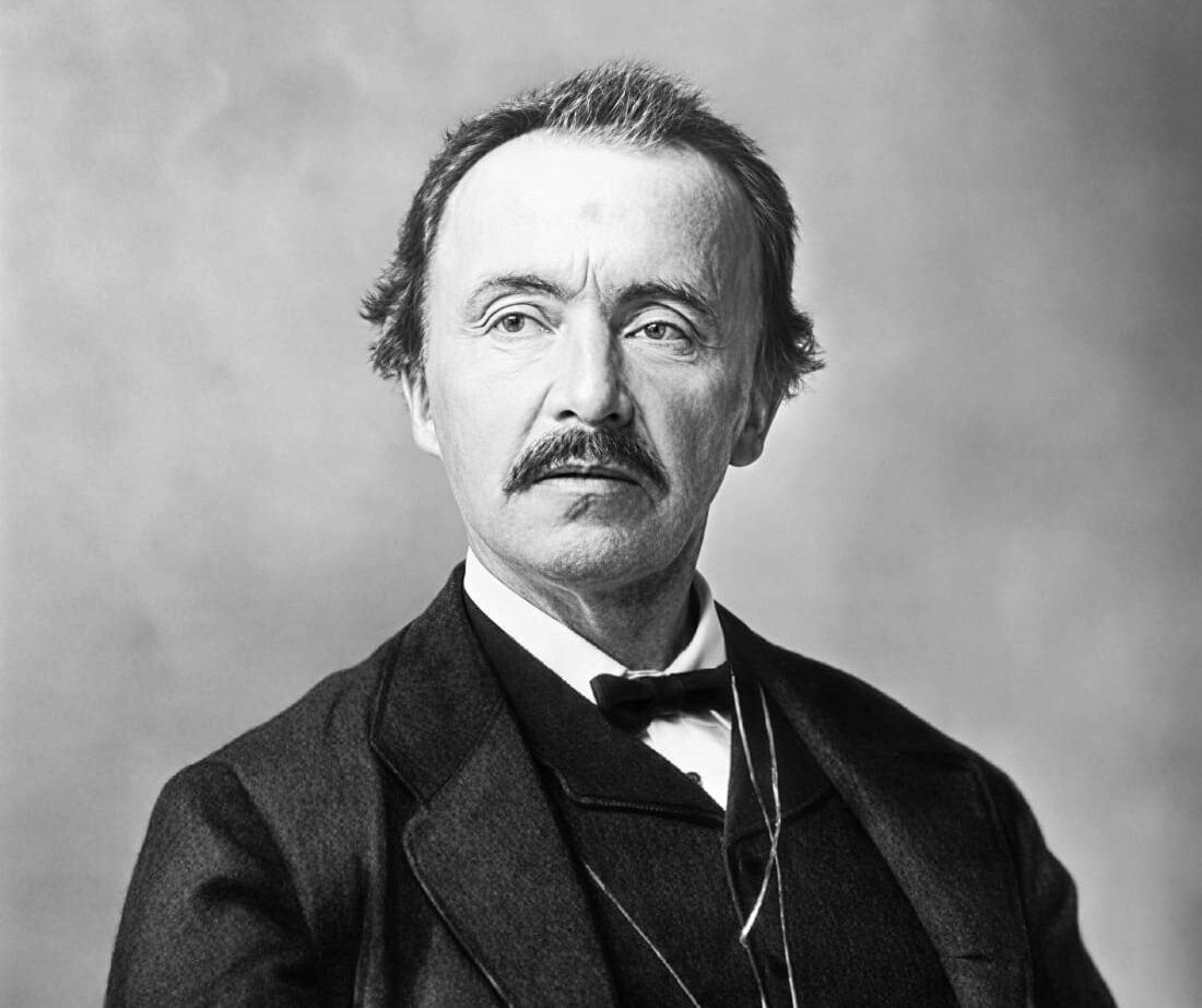Black-and-white portrait of Heinrich Schliemann, the excavator who first identified Hisarlık as Troy