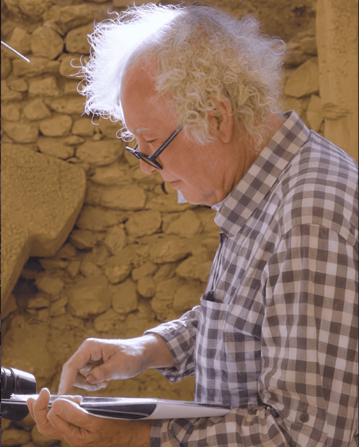 Murat Akman reviewing field documentation at the Göbeklitepe excavation site in Diyarbakır Province