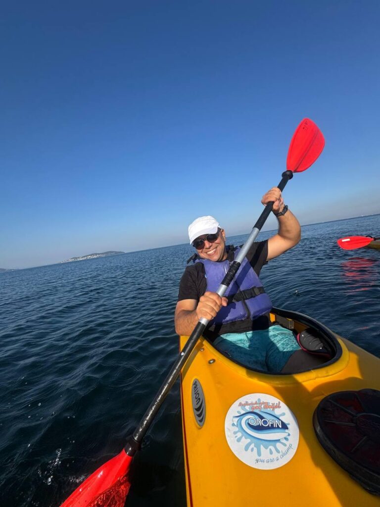 Istanbul tour guide Orçun Kamit kayaking during his free time, reflecting his active lifestyle and love of the outdoors.