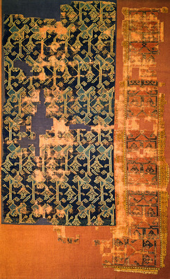 Rare 13th-century Anatolian Seljuk rug from Konya, featuring geometric motifs and one of the earliest surviving Turkish carpets.