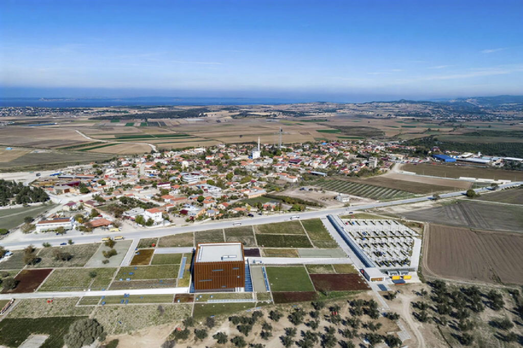 Aerial view of the Troy Museum's corten steel building beside Tevfikiye village near Çanakkale