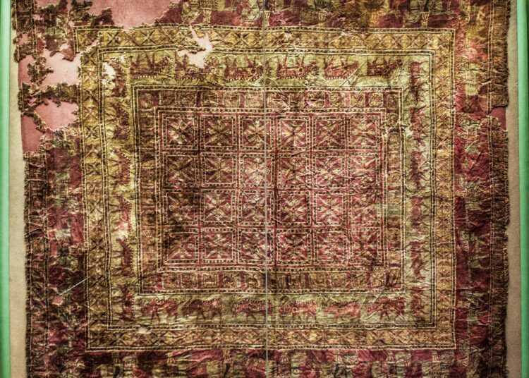 The Pazyryk Carpet, the world's oldest known pile carpet, dating to the 5th century BCE and featuring intricate geometric and animal motifs.