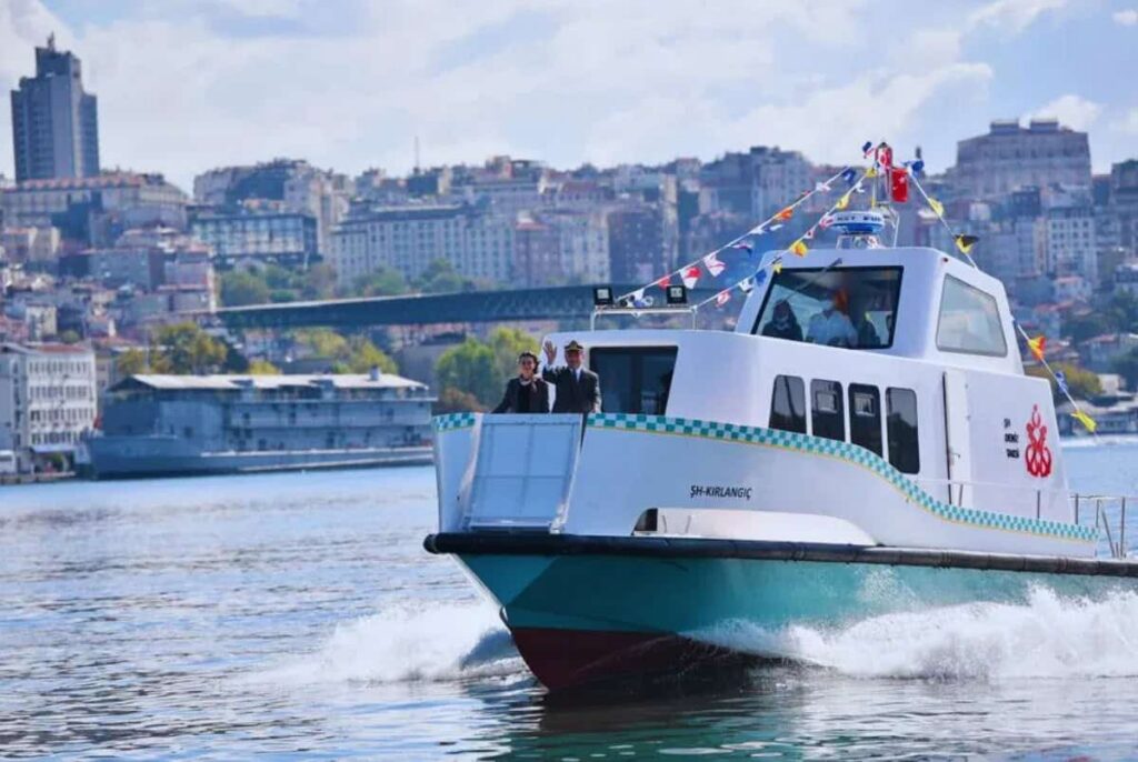 IMM Sea Taxi carrying passengers across the Bosphorus in Istanbul