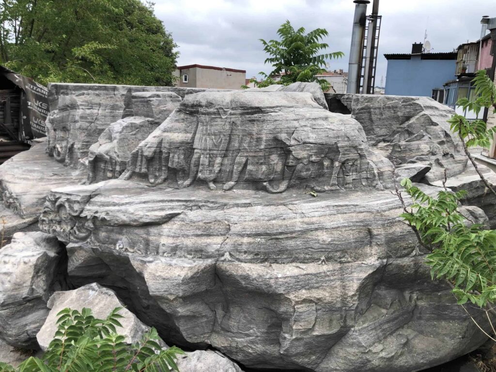 Weathered relief carvings on the surviving base of the Column of Arcadius