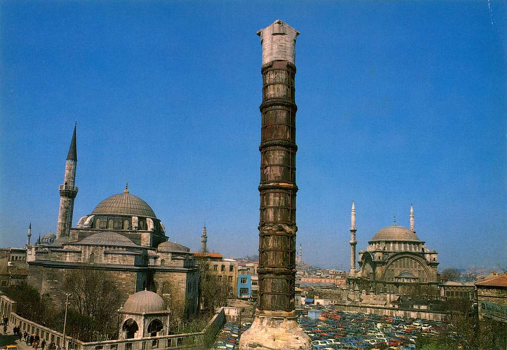 Column of Constantine standing under a blue sky in modern Istanbul